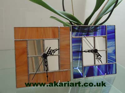 A range of free-standing clocks in different finishes