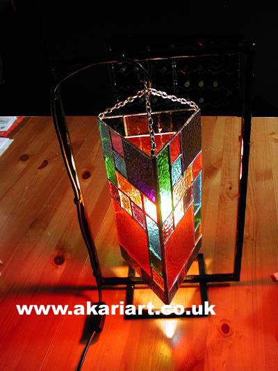 Multi-coloured tile hanging shade with electric light