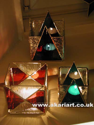 A range of free-standing Candle holders in different finishes