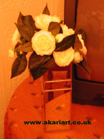 Mirrored vases provide an unusual and attractive focal point